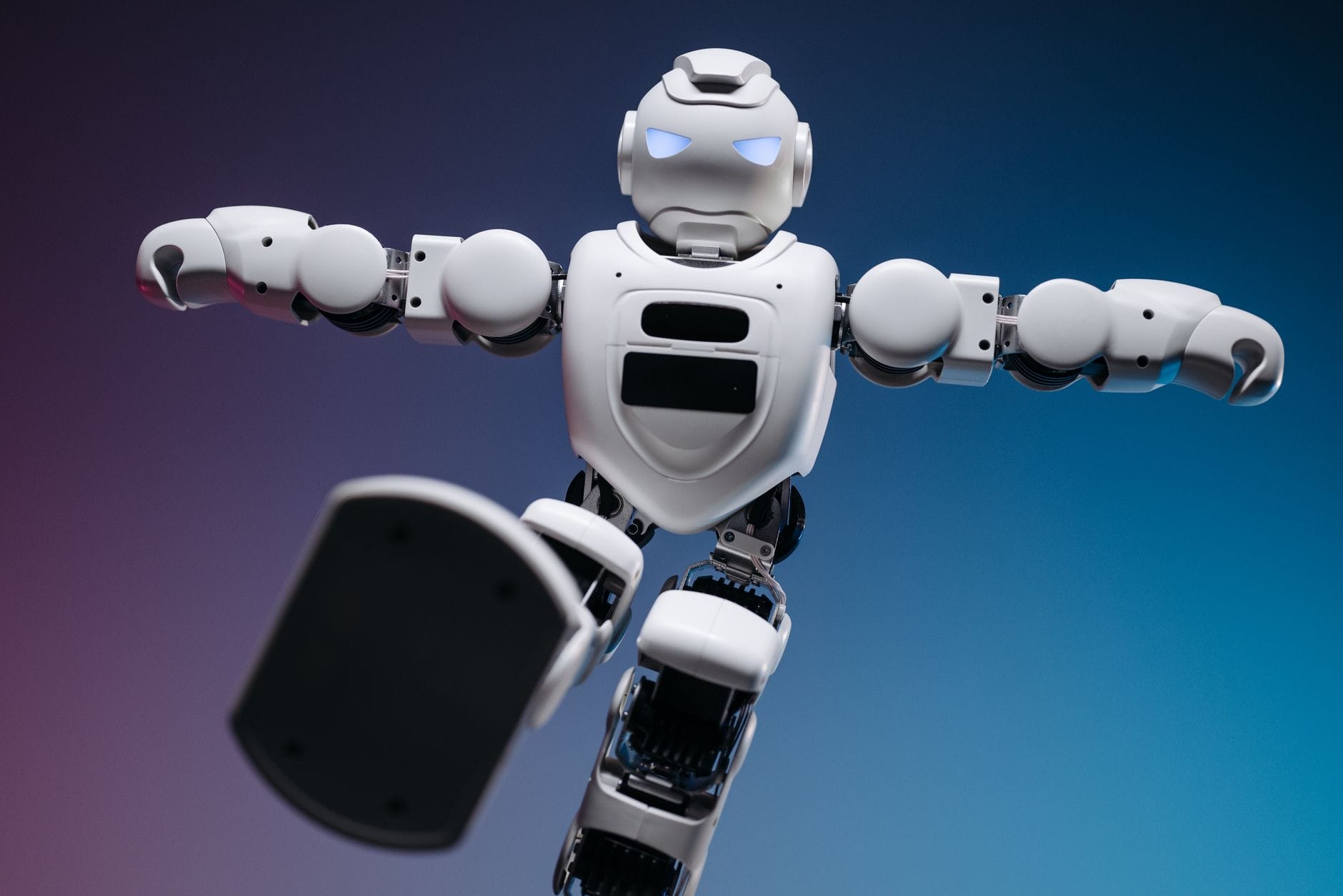 Close-up of a humanoid robot in motion, showcasing modern robotics innovation.
